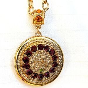 Heidi Daus Gold Tone and Purple Necklace with Intricate Pendant